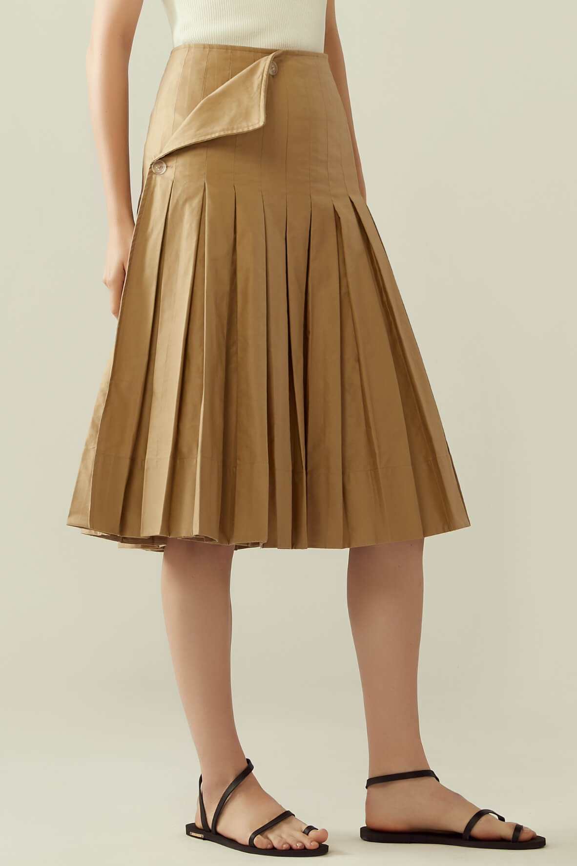 Pleated wrap skirt with flap