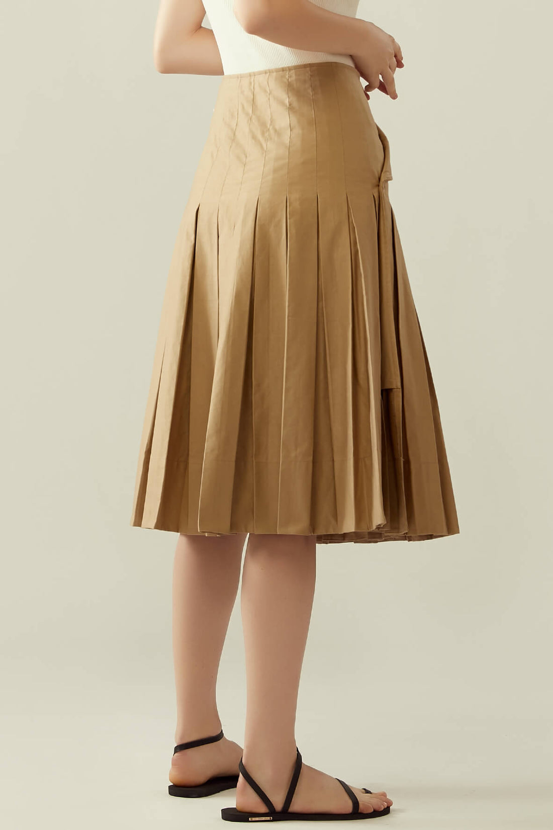 Pleated wrap skirt with flap